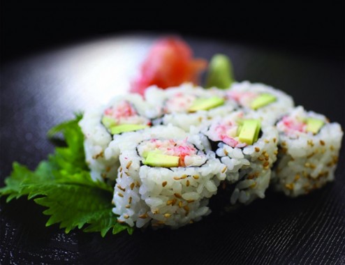 Sushi Rolls on Black Plate